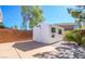There is a shed in the back yard with the words Canyon Country on it at 708 Canyon Country Cir, Henderson, NV 89002
