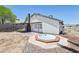 Backyard features in-ground spa and covered patio at 7139 Mountain Moss Dr, Las Vegas, NV 89147