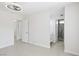 Open bedroom with ensuite bathroom featuring stone-look tile shower at 7139 Mountain Moss Dr, Las Vegas, NV 89147
