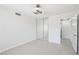 Bedroom with sliding door closet with tile floor, and modern ceiling fan at 7139 Mountain Moss Dr, Las Vegas, NV 89147