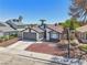 Attractive single-story home featuring a well-kept lawn and tidy landscaping in a suburban setting at 7139 Mountain Moss Dr, Las Vegas, NV 89147