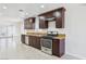This modern kitchen features stainless appliances and attractive granite countertops at 7139 Mountain Moss Dr, Las Vegas, NV 89147