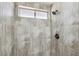 This shower has gray tile walls and a bronze showerhead at 7139 Mountain Moss Dr, Las Vegas, NV 89147