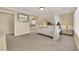 Spacious bedroom features a four poster bed and an attached bath with a tub and shower at 7183 Majestic Bluff Pl, Las Vegas, NV 89113