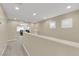 Spacious hallway with arched doorway and recessed lights at 7183 Majestic Bluff Pl, Las Vegas, NV 89113