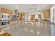 Open kitchen with granite countertops, stainless steel appliances, and a large central island with seating at 7183 Majestic Bluff Pl, Las Vegas, NV 89113