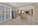 Bright open kitchen with stainless steel appliances and an open floor plan leading to the living room at 7183 Majestic Bluff Pl, Las Vegas, NV 89113