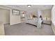 Comfortable primary bedroom with access to ensuite bath at 7183 Majestic Bluff Pl, Las Vegas, NV 89113