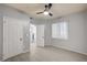 Bedroom with tile floor, ceiling fan and window at 7189 S Durango Dr # 208, Las Vegas, NV 89113