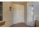 Entrance featuring unit number, window and desertscape stucco at 7189 S Durango Dr # 208, Las Vegas, NV 89113