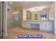 Primary bathroom with double sinks, a glass shower, and great lighting at 7365 Mission Hills Dr, Las Vegas, NV 89113