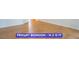 Spacious primary bedroom featuring wood-look flooring at 7365 Mission Hills Dr, Las Vegas, NV 89113