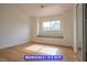 Bedroom with a built-in bench seat below the window at 7365 Mission Hills Dr, Las Vegas, NV 89113