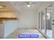 Breakfast nook with a ceiling fan and sliding glass doors that provide outdoor access at 7365 Mission Hills Dr, Las Vegas, NV 89113