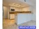 Breakfast nook featuring granite countertops, white cabinets, and stainless steel appliances at 7365 Mission Hills Dr, Las Vegas, NV 89113