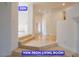A view from the living room showcases a bright entryway at 7365 Mission Hills Dr, Las Vegas, NV 89113