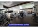 Community fitness center with modern exercise equipment and ample natural light at 7365 Mission Hills Dr, Las Vegas, NV 89113