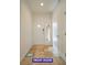 Bright foyer with tiled floors and a white front door creating a welcoming entrance to the home at 7365 Mission Hills Dr, Las Vegas, NV 89113