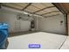 Bright two car garage with sealed concrete floors and utility access at 7365 Mission Hills Dr, Las Vegas, NV 89113