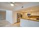 Kitchen featuring granite countertops, white cabinets and stainless steel appliances at 7365 Mission Hills Dr, Las Vegas, NV 89113