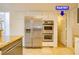 A walk-in pantry features rows of shelving for kitchen storage at 7365 Mission Hills Dr, Las Vegas, NV 89113