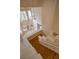 Stylish staircase with hardwood steps and painted walls leading to a well lit living area at 7365 Mission Hills Dr, Las Vegas, NV 89113