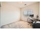 Bedroom featuring a large window with modern work station makes a perfect home office at 7856 Tolberts Mill Dr, Las Vegas, NV 89131
