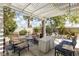 Backyard area featuring a pergola with outdoor furniture, providing a shaded area for relaxation at 7904 Seabourn Ct, Las Vegas, NV 89129