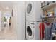 Conveniently located laundry area with stacked washer and dryer at 7904 Seabourn Ct, Las Vegas, NV 89129