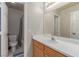 Cozy bathroom featuring a shower and vanity, creating a private and comfortable space at 7912 Horn Beam Ct, Las Vegas, NV 89131