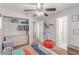 Bright bedroom with a ceiling fan and storage, perfect for creating a comfortable and inviting space at 7912 Horn Beam Ct, Las Vegas, NV 89131