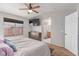 Comfortable bedroom featuring a window, and an ensuite bathroom for added convenience at 7912 Horn Beam Ct, Las Vegas, NV 89131
