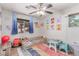 Playful bedroom with blue accents, and fun decorations, creating a joyful and imaginative space at 7912 Horn Beam Ct, Las Vegas, NV 89131