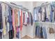 This walk-in closet has ample storage space with rods and shelves to organize all your belongings at 7912 Horn Beam Ct, Las Vegas, NV 89131