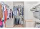 This walk-in closet has ample storage space with rods and shelves to organize all your belongings at 7912 Horn Beam Ct, Las Vegas, NV 89131