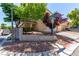 Charming home with desert landscaping and a decorative block wall on a sunny corner lot at 7912 Horn Beam Ct, Las Vegas, NV 89131