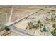 Overhead shot of a property with a house, large lot, and surrounding desert terrain at 7960 Quarter Horse Ave, Pahrump, NV 89061