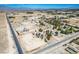 A high aerial shot of a rural community amidst a desert landscape at 7960 Quarter Horse Ave, Pahrump, NV 89061
