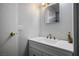 Compact bathroom featuring a vanity with a white countertop, and chrome fixtures at 7960 Quarter Horse Ave, Pahrump, NV 89061