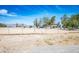 Land with fence, outbuildings, and desert landscape at 7960 Quarter Horse Ave, Pahrump, NV 89061