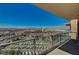 Expansive balcony view with clear glass railing overlooking the city and mountains at 8255 S Las Vegas Blvd # 2004, Las Vegas, NV 89123