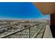 Beautiful balcony with glass railings showcasing panoramic city and mountain views at 8255 S Las Vegas Blvd # 2004, Las Vegas, NV 89123