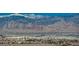 Wide shot of Las Vegas buildings and homes with scenic mountain range backdrop on a clear day at 8255 S Las Vegas Blvd # 2004, Las Vegas, NV 89123