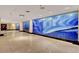 Hallway with marble floors, artistic mural on wall and hallway lighting at 8255 S Las Vegas Blvd # 2004, Las Vegas, NV 89123