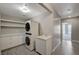 Modern laundry room with washer and dryer, ample storage, and tile flooring at 8255 S Las Vegas Blvd # 2004, Las Vegas, NV 89123