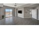 A large open living space that has tile floors and large glass doors for expansive city views at 8255 S Las Vegas Blvd # 2004, Las Vegas, NV 89123