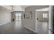 Spacious living area featuring modern gray tiling and views to the city skyline at 8255 S Las Vegas Blvd # 2004, Las Vegas, NV 89123