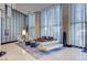 Bright lobby with comfortable seating, tall windows with sheer curtains, and tiled floors at 8255 S Las Vegas Blvd # 2004, Las Vegas, NV 89123