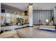 Elegant lobby features concierge desk, crystal chandelier, and seating area with modern decor and tiled floors at 8255 S Las Vegas Blvd # 2004, Las Vegas, NV 89123