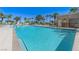 Resort-style swimming pool with inviting lounge chairs and clear blue water at 8255 S Las Vegas Blvd # 2004, Las Vegas, NV 89123
